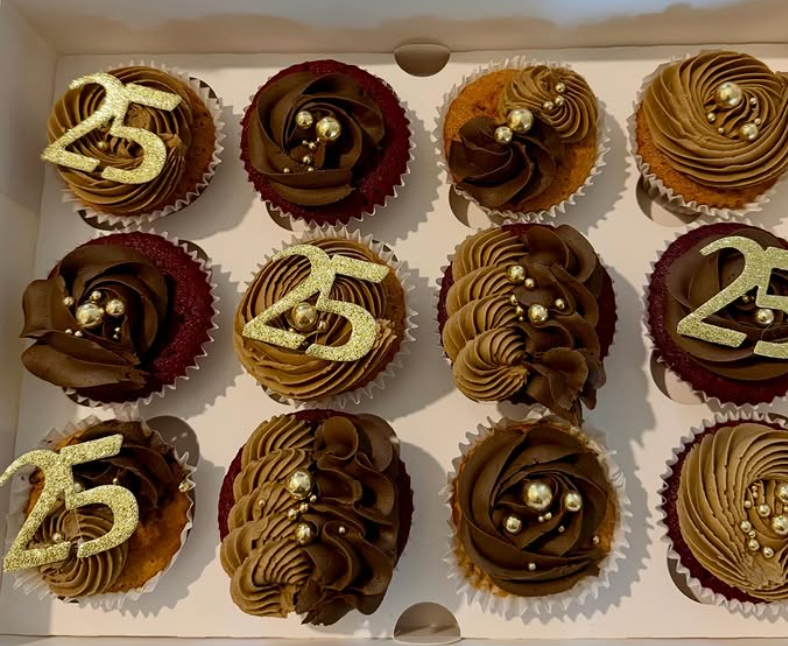 Twelve chocolate buttercream cupcakes with gold pearls and glitter 25 toppers